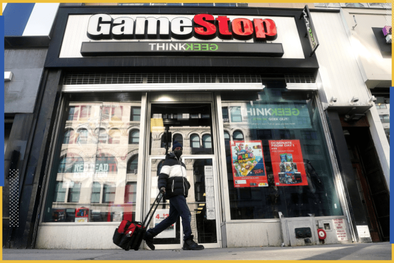 A person walks past a GameStop store in the Manhattan borough of New York City, New York, U.S., January 29, 2021. REUTERS/Carlo Allegri