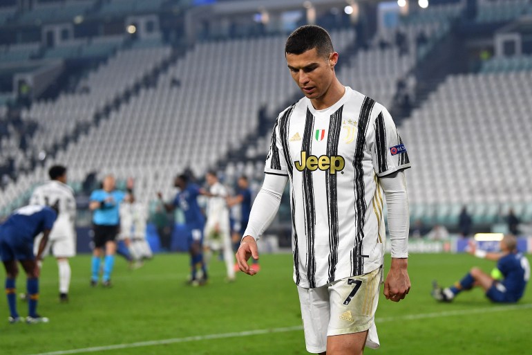 Juventus v FC Porto - UEFA Champions League Round Of 16 Leg Two TURIN, ITALY - MARCH 09: Cristiano Ronaldo of Juventus looks dejected during the UEFA Champions League Round of 16 match between Juventus and FC Porto at Juventus Arena on March 09, 2021 in Turin, Italy. Sporting stadiums around Italy remain under strict restrictions due to the Coronavirus Pandemic as Government social distancing laws prohibit fans inside venues resulting in games being played behind closed doors. (Photo by Valerio Pennicino/Getty