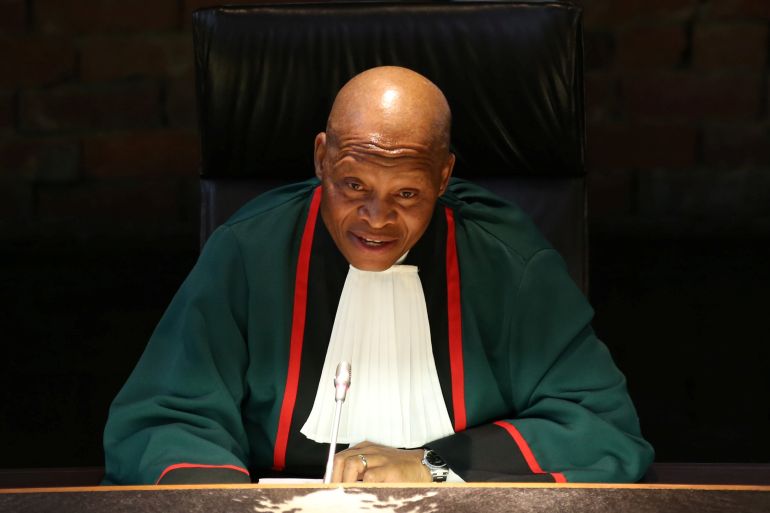 South Africa's Chief Justice Mogoeng Mogoeng gestures as he makes a ruling at the Constitutional Court in Johannesburg, South Africa