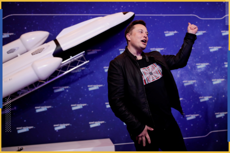 SpaceX owner and Tesla CEO Elon Musk gestures after arriving on the red carpet for the Axel Springer award, in Berlin, Germany, December 1, 2020. REUTERS/Hannibal Hanschke/Pool TPX IMAGES OF THE DAY