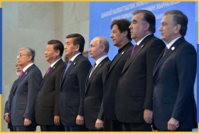 REFILE - CORRECTING BYLINE (L-R) India’s Prime Minister Narendra Modi, Kazakhstan's President Kassym-Jomart Tokayev, China’s President Xi Jinping, Kyrgyzstan’s President Sooronbay Jeenbekov, Russia’s President Vladimir Putin, Pakistan’s Prime Minister Imran Khan, Tajikistan’s President Emomali Rakhmon and Uzbekistan's President Shavkat Mirziyoyev pose for a family photo during the Shanghai Cooperation Organization (SCO) summit in Bishkek, Kyrgyzstan June 14, 2019. Sputnik/Alexei Druzhinin/Kremlin via REUTERS ATTENTION EDITORS - THIS IMAGE WAS PROVIDED BY A THIRD PARTY.
