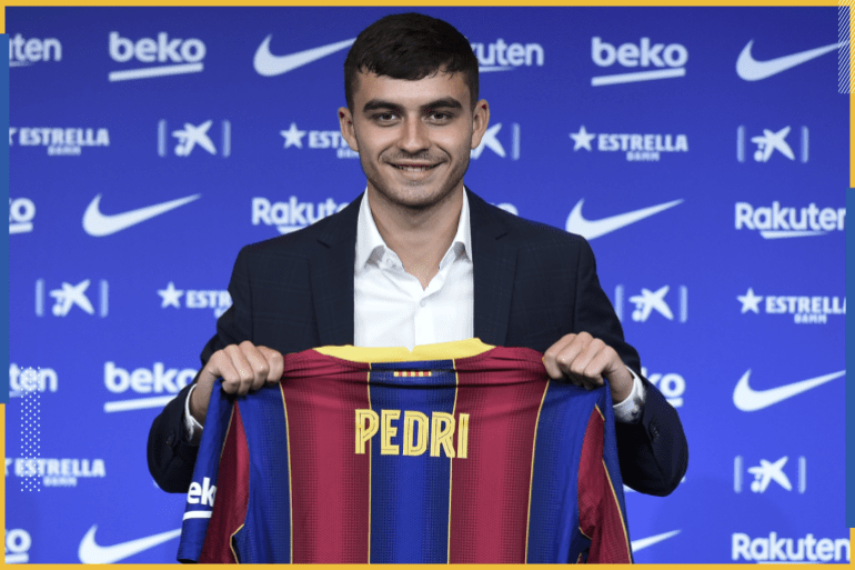 FC Barcelona Introduce New Player Pedro Gonzalez Lopez - 'Pedri'- - BARCELONA, SPAIN - AUGUST 20: Barcelona's new Spanish forward Pedri poses with his new jersey during his official presentation at the Camp Nou Stadium in Barcelona on August 20, 2020.