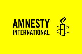 شعار منظمة العفو الدولية "أمنستي" (منظمة العفو الدولية)