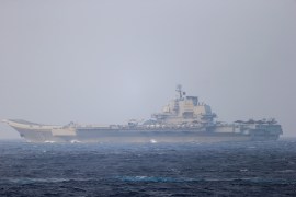 Chinese aircraft carrier Liaoning sails through the Miyako Strait near Okinawa on its way to the Pacific in this handout photo