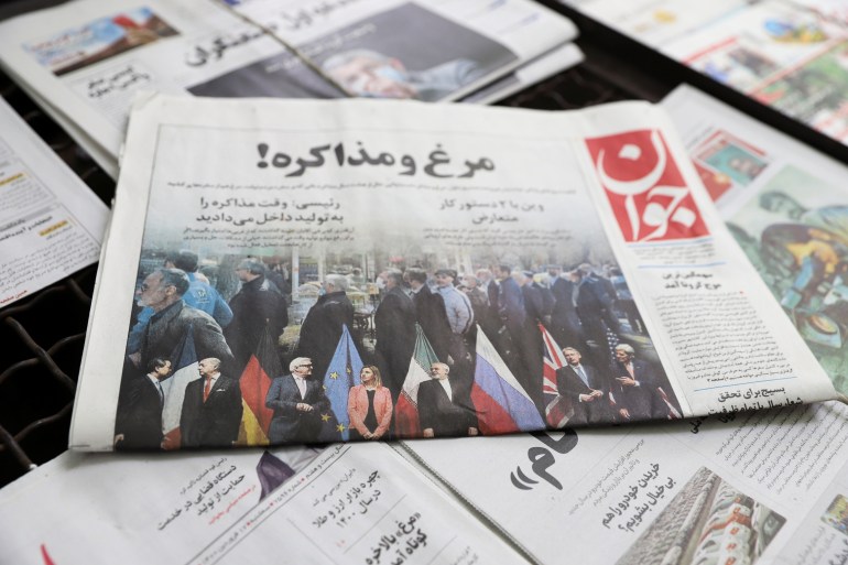 A newspaper with a front picture regarding Iran P5+1 talk is seen in Tehran