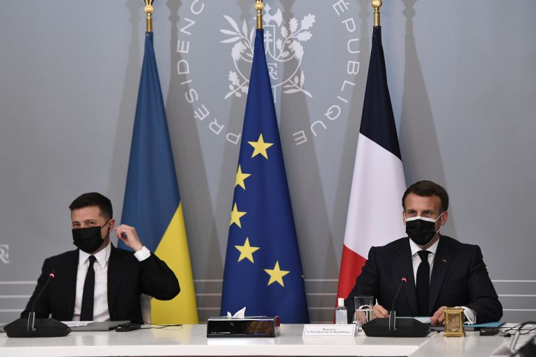 French President Emmanuel Macron and Ukrainian President Volodymyr Zelenskiy hold a news conference following their meeting at the Elysee Palace in Paris