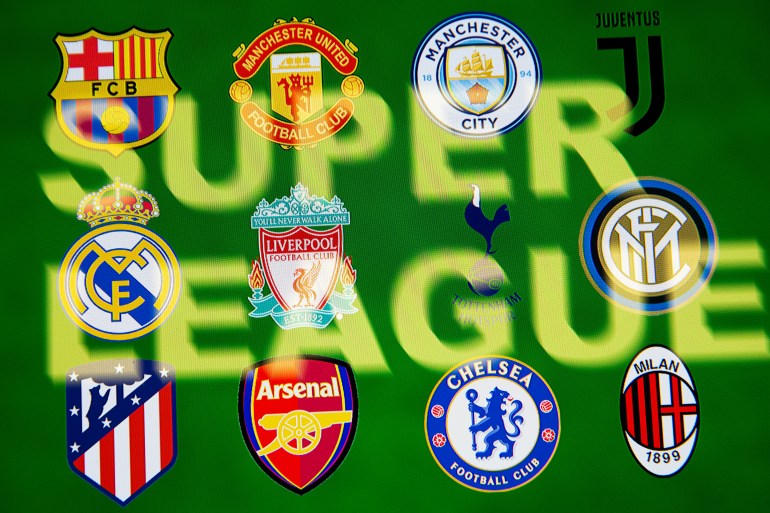 Super League words are seen in front of twelve of Europe's top football clubs logos in this illustration Super League words are seen in front of twelve of Europe's top football clubs logos in this illustration taken April 19, 2021. REUTERS/Dado Ruvic/Illustration