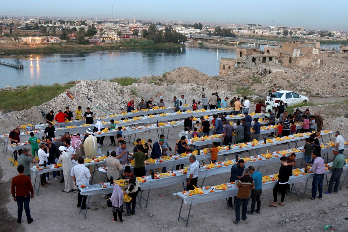 Iftar collective tables in Mosul, northern Iraq (Reuters)