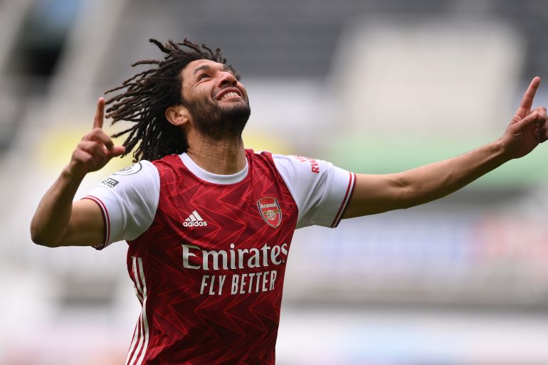 Newcastle United v Arsenal - Premier League NEWCASTLE UPON TYNE, ENGLAND - MAY 02: Mohamed Elneny of Arsenal celebrates after scoring their side's first goal during the Premier League match between Newcastle United and Arsenal at St. James Park on May 02, 2021 in Newcastle upon Tyne, England. Sporting stadiums around the UK remain under strict restrictions due to the Coronavirus Pandemic as Government social distancing laws prohibit fans inside venues resulting in games being played behind closed doors. (Photo by Stu Forster/Getty Images)