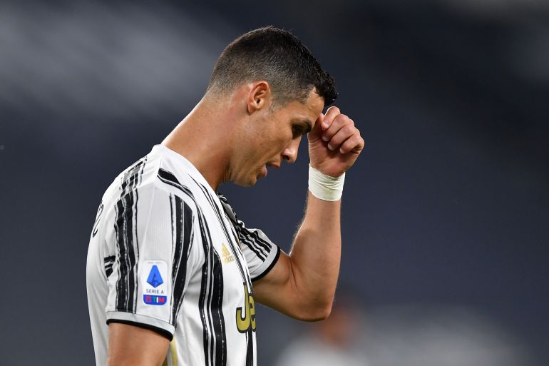 Juventus v AC Milan - Serie A TURIN, ITALY - MAY 09: Cristiano Ronaldo of Juventus looks dejected during the Serie A match between Juventus and AC Milan at on May 09, 2021 in Turin, Italy. Sporting stadiums around Italy remain under strict restrictions due to the Coronavirus Pandemic as Government social distancing laws prohibit fans inside venues resulting in games being played behind closed doors. (Photo by Valerio Pennicino/Getty Images)