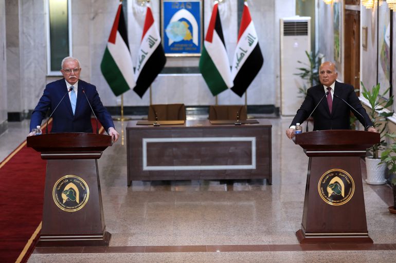 Palestinian Foreign Minister Riyad al-Maliki (L) meets Iraqi Foreign Minister Fuad Hussein (R) in Baghdad, Iraq on May 23, 2021. ( Murtadha Al-Sudani - Anadolu Agency