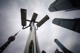 Surveillance cameras are seen at Lujiazui financial district in Pudong