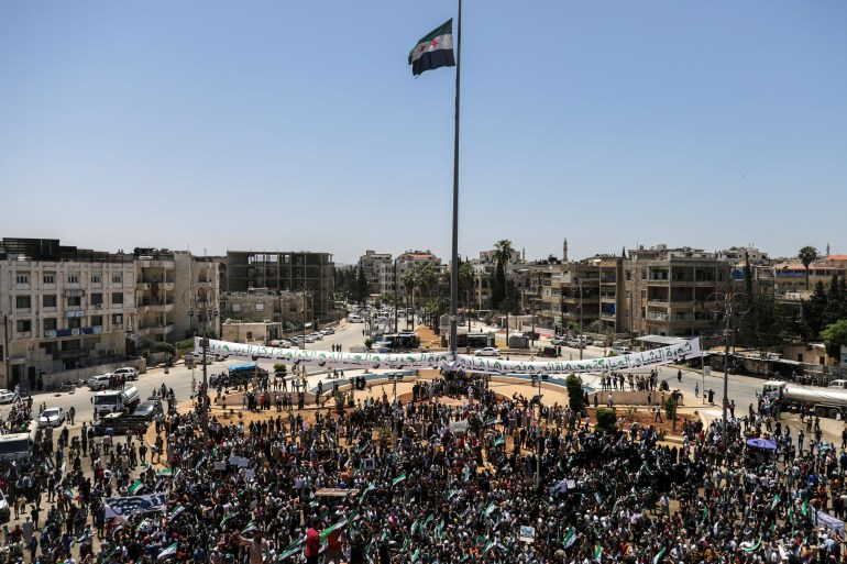 Syrians in rebel held town of Idlib protest elections