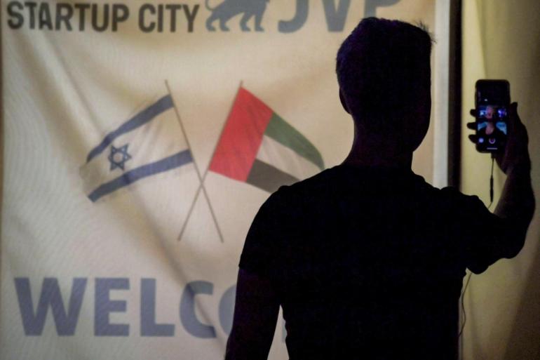 Israeli and UAE flags are seen at a tech conference in Dubai in October 2020 (AFP)