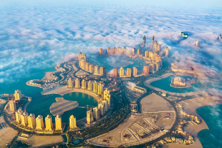 Aerial view of the Pearl-Qatar island in Doha through the morning fog. Qatar , the Persian Gulf