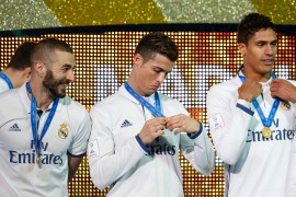 Real Madrid's Karim Benzema, Cristiano Ronaldo and Raphael Varane after winning the FIFA Club World Cup Final
