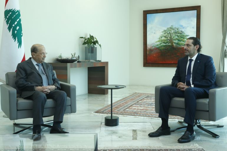 Lebanon's President Michel Aoun meets with Lebanese Prime Minister-Designate Saad al-Hariri at the presidential palace in Baabda