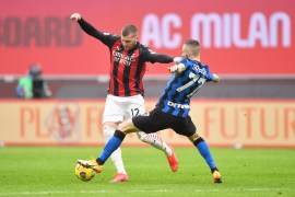 Serie A - AC Milan v Inter Milan Soccer Football - Serie A - AC Milan v Inter Milan - San Siro, Milan, Italy - February 21, 2021 AC Milan's Ante Rebic in action with Inter Milan's Marcelo Brozovic REUTERS/Daniele Mascolo