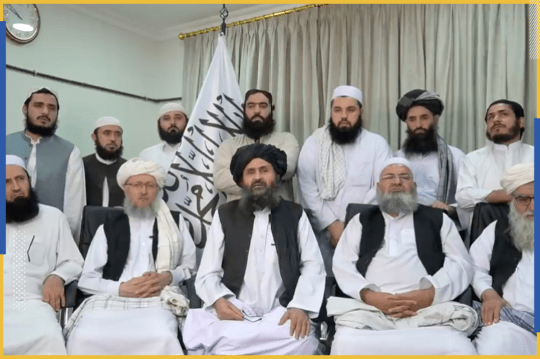 Mullah Baradar Akhund, a senior official of the Taliban, seated with a group of men, makes a video statement, in this still image taken from a video recorded in an unidentified location and released on August 16, 2021. Social Media/via REUTERS THIS IMAGE HAS BEEN SUPPLIED BY A THIRD PARTY.