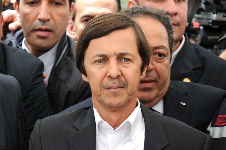 (FILES) In this file photo taken on May 19, 2012 Said Bouteflika, brother of Algerian President, attends the funeral of late Algerian singer Warda Al-Jazairia, one of the most famous singers in the Arab world, at the El-Alia cemetery in Algiers. An Algerian military court sentenced Saïd Bouteflika, brother of deposed President Abdelaziz Bouteflika, to 15 years in prison for "attacking the authority of the army" and "plotting against the authority of the state", the official agency APS reported on Wednesday. Farouk Batiche / AFP
