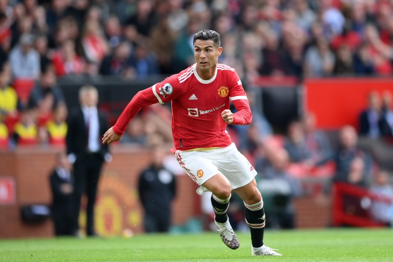 Manchester United v Newcastle United - Premier League MANCHESTER, ENGLAND - SEPTEMBER 11: Cristiano Ronaldo of Manchester United in action during the Premier League match between Manchester United and Newcastle United at Old Trafford on September 11, 2021 in Manchester, England. (Photo by Laurence Griffiths/Getty Images)