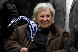 FILE PHOTO: Greek composer Mikis Theodorakis participates in a rally against the use of the term "Macedonia" in any settlement to a dispute between Athens and Skopje over the former Yugoslav republic's name, in Athens, Greece, February 4, 2018. REUTERS/Costas Baltas/File Photo