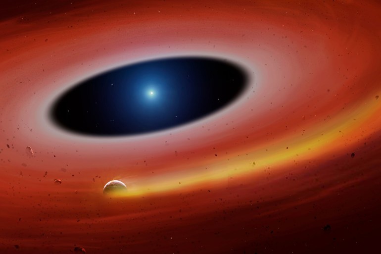 Artist's impression of a disintegrating exoplanet orbiting within a planetary debris disc. This planet was found by a team led by Warwick University and announced in 2019. They were looking at a dusty ring around the central star, a white dwarf, when the latter underwent a supernova explosion. A signal in their data, repeating every two hours, indicates the presence of a moving stream of gas in the ring, orbiting the white dwarf rapidly. The object emitting the gas stream is estimated to be an 800-km-wide asteroid-like body, similar in size to Ceres, but made almost entirely of iron.