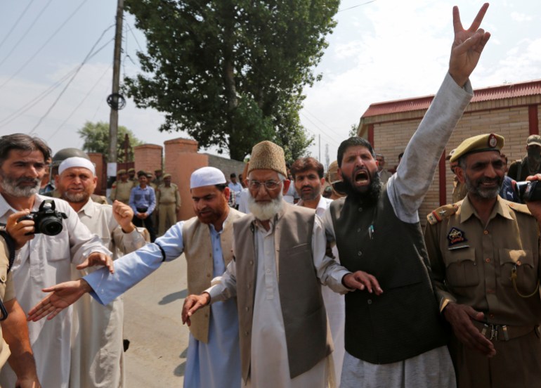 Geelani, chairman of the hardline Hurriyat (Freedom) Conference group, and his supporters attend a protest in Srinagar against the recent killings in Kashmir