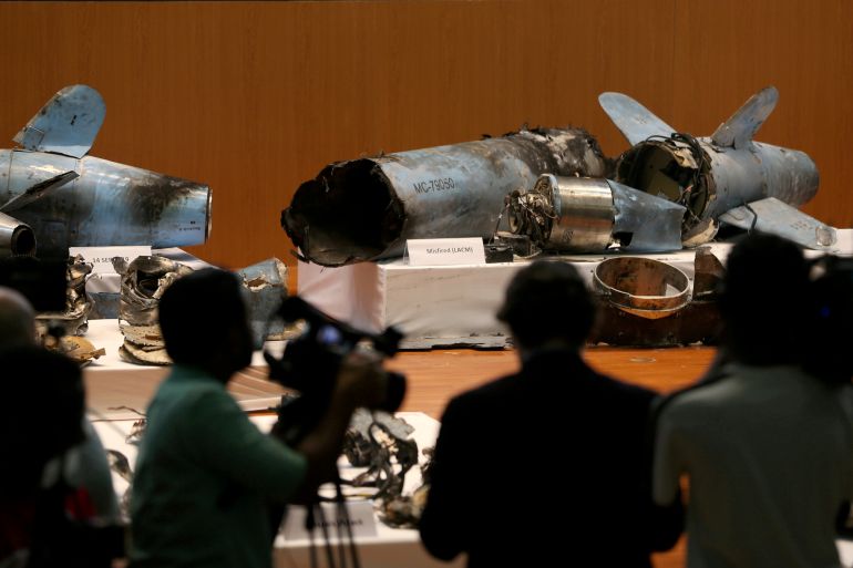 Remains of the missiles which Saudi government says were used to attack an Aramco oil facility, are displayed during a news conference in Riyadh