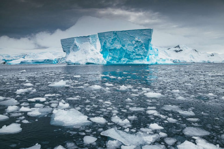 Iceberg sits still on a calm day in Antarctica