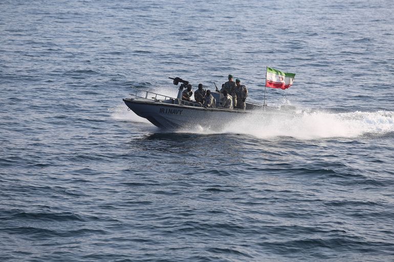 Members of the Iranian navy participate in a joint naval exercise between Iran and Russia in the Indian Ocean