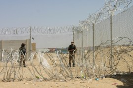 Army soldiers stand guard during a temporary closure of the Friendship Gate crossing point at the Pakistan-Afghanistan border town of Chaman