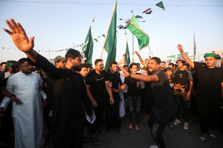 Demonstrators supporting candidate Alaa Al-Haidari protest against his loss in the preliminary results of Iraq's parliamentary election, in Basra
