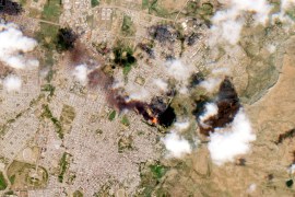 A satellite image shows smoke rising from Mekelle