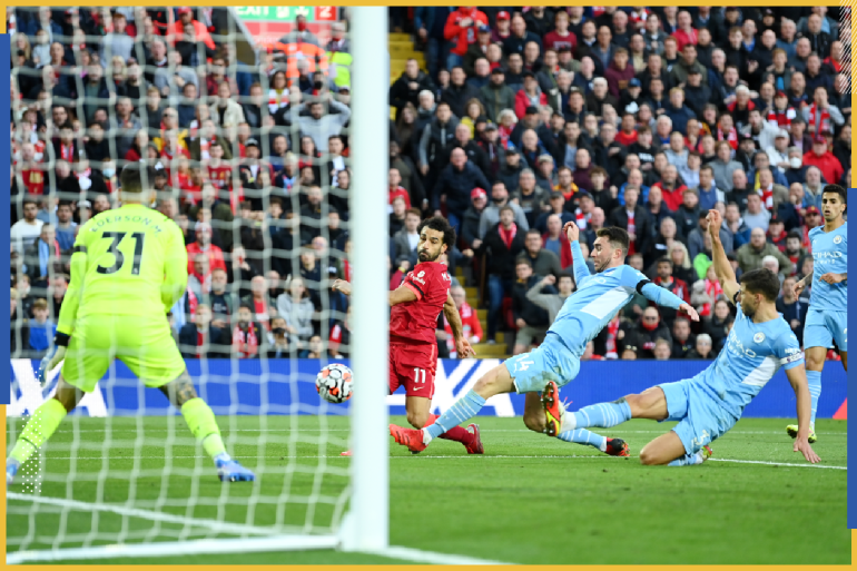 LIVERPOOL, ENGLAND - OCTOBER 03: Mohamed Salah of Liverpool scores their team's second goal during the Premier League match between Liverpool and Manchester City at Anfield on October 03, 2021 in Liverpool, England. (Photo by Michael Regan/Getty Images)