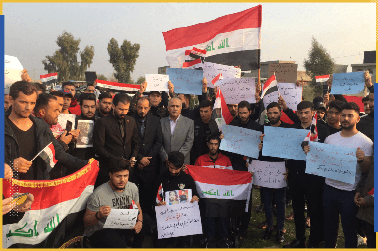Iraqi PM says he will submit resignation to parliament- - KIRKUQ, BAGHDAD - NOVEMBER 29: Iraqis hold flags as they celebrate after Iraqi Prime Minister Adil Abdul-Mahdi said he would submit his resignation to parliament, in Kirkuq, Iraq on November 29, 2019.
