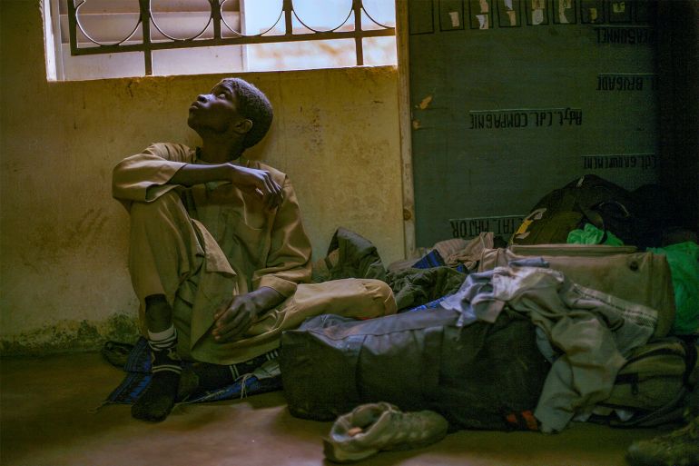 Adama Drabo, 16, who was arrested on suspicion of working for Islamic militant group MUJAO, sits in the police station in Sevare, some 620 kilometers (385 miles) north of Mali's capital Bamako Friday, Jan. 25, 2013. Trapped in conflict in a volatile region, children in West and Central Africa have become the most recruited by armed groups with the highest number of victims of sexual violence in the world, said a new report Tuesday Nov. 23, 2021 by the United Nations Children's Fund. (AP Photo/Jerome Delay, File) JEROME DELAY AP