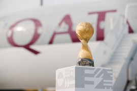 Hamad International Airport (HIA) and Qatar Airways crew welcoming the FIFA Arab Cup trophy to Qatar.