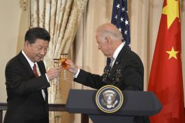 Chinese President Xi and U.S. Vice President Biden raise their glasses in a toast during a luncheon at the State Department, in Washington