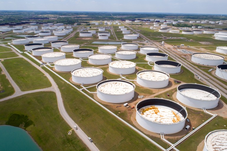 Crude oil storage tanks are seen in an aerial photograph at the Cushing oil hub