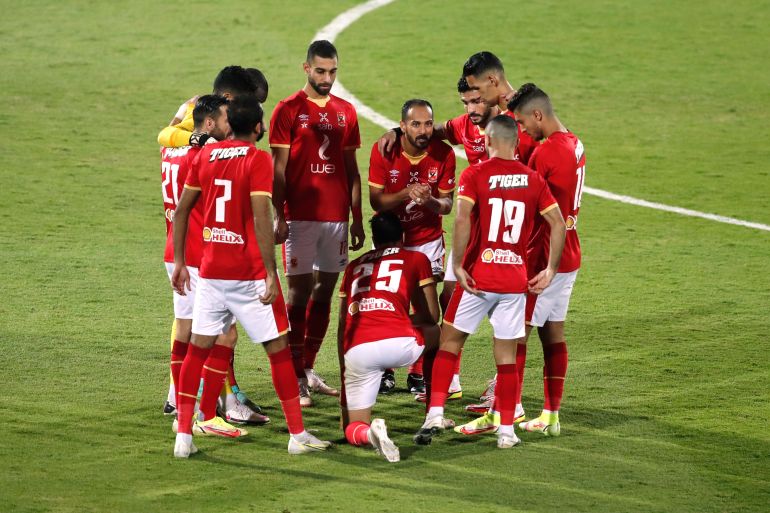 African Champions League - Al Ahly v Union Sportive de la Gendarmerie Nationale Soccer Football - African Champions League - Al Ahly v Union Sportive de la Gendarmerie Nationale - Al Salam Stadium, Cairo, Egypt - October 23, 2021 Al Ahly's Walid Soliman talks to teammates during the half time REUTERS/Amr Abdallah Dalsh