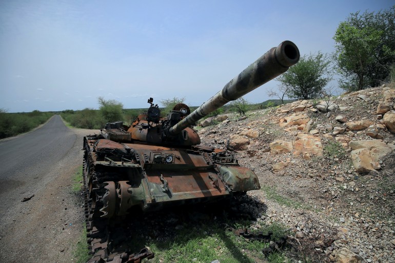 FILE PHOTO: A tank damaged during the fighting between Ethiopia?s National Defense Force (ENDF) and Tigray Special Force stands on the outskirts of Humera town in Ethiopia July 1, 2021 Picture taken July 1, 2021. REUTERS/Stringer/File Photo