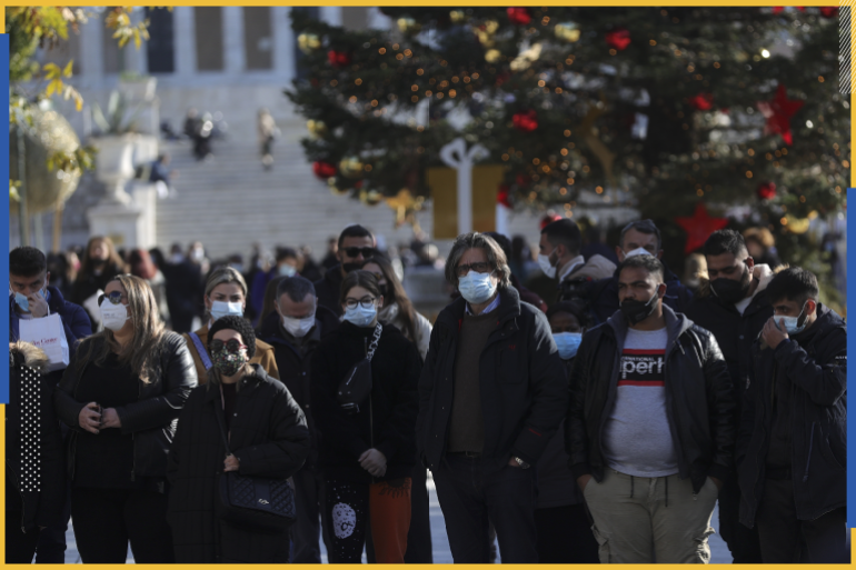 Greece decide to increase restrictions against the Covid-19- - ATHENS, GREECE - DECEMBER 24: People wear mask at outdoors as Greece decide to increase restrictions against the Covid-19 in Athens, Greece on December 24, 2021.Double masks or KN 95 type special masks, which provide high protection, will be used in markets and public transportation vehicles.