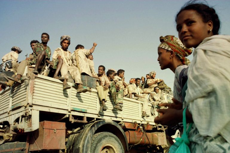 Eritrean soldiers celebrate the country's ninth anniversary of independence from Ethiopia 23 May. Eritrea and Ethiopia both reported intense fighting on Wednesday but issued conflicting claims of success in their ferocious border war. FMS