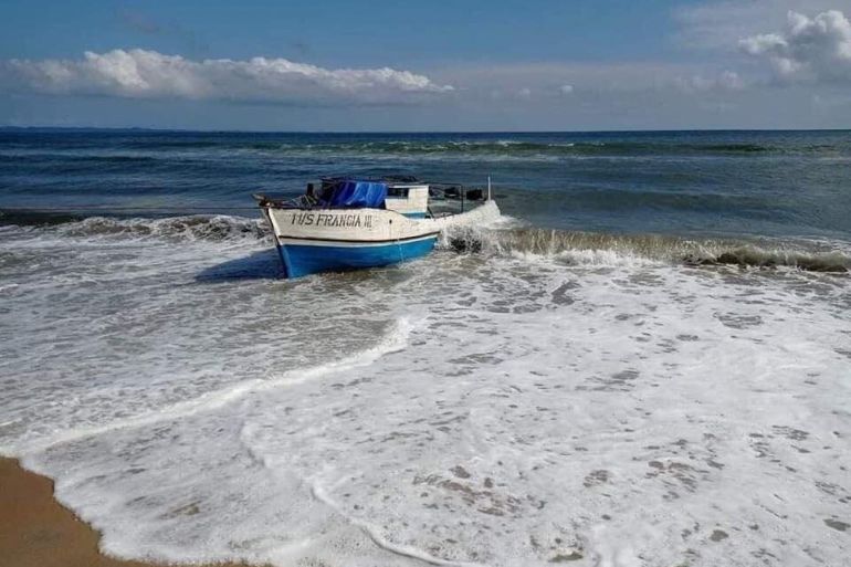 Boat that sank off the coast of northeastern Madagascar on Monday is pulled to the beach