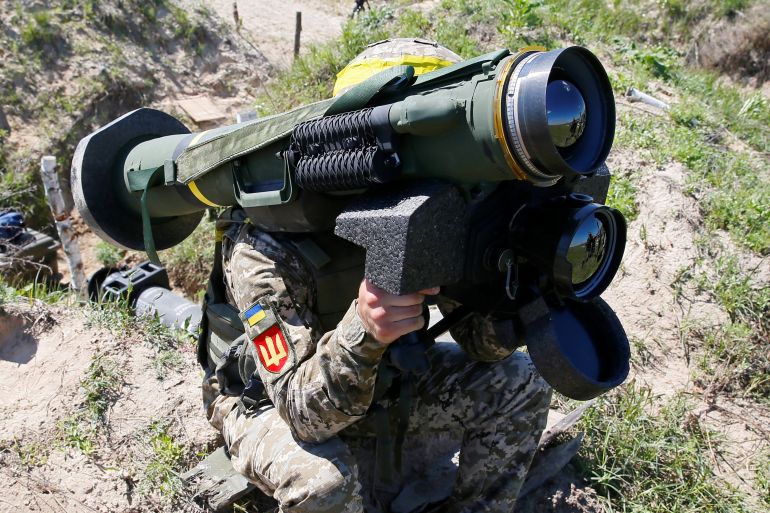 A soldier holds a Javelin missile system during a military exercise in the training centre of Ukrainian Ground Forces near Rivne