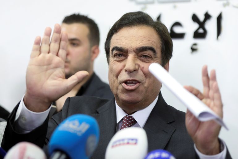 Lebanese Information Minister George Kordahi gestures during a news conference in Beirut