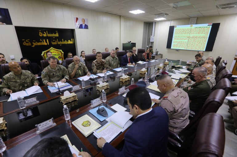 Lieutenant-General Abdul Amir al-Shammari speaks during a meeting with U.S. and coalition commanders in Baghdad