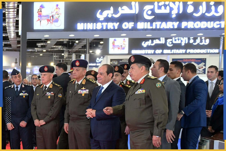 Egyptian President Abdel Fattah al-Sisi looks at Egypt's Ministery of Military Productions section with heads of the military on the first day of Egypt Defense Expo, showcasing military systems and hardware in Cairo, Egypt, December 3, 2018. In this handout picture courtesy of the Egyptian Presidency. The Egyptian Presidency/Handout via REUTERS ATTENTION EDITORS - THIS IMAGE WAS PROVIDED BY A THIRD PARTY