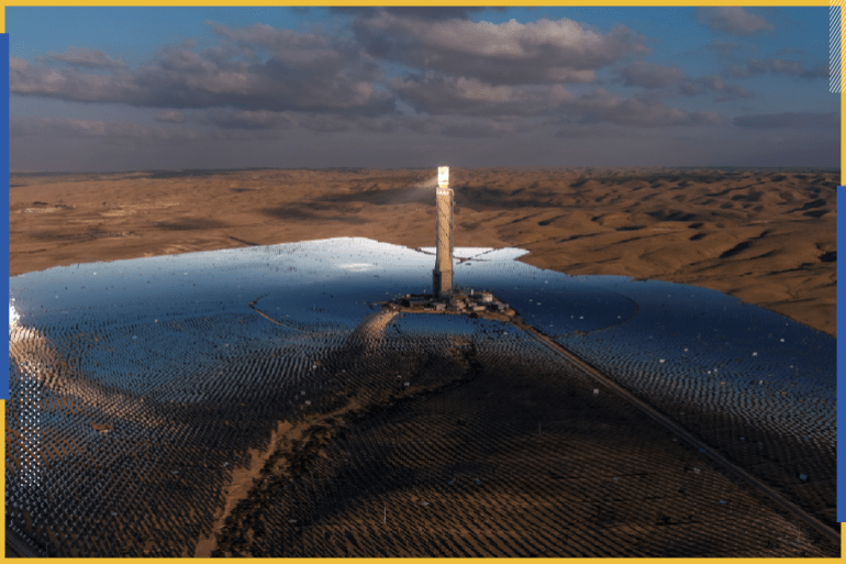 A view of a solar power tower in a solar farm near the Israeli kibbutz Ashalim in the Negev desert, southern Israel, October 23, 2021. Picture taken with a drone on October 23, 2021. REUTERS/ Ilan Rosenberg
